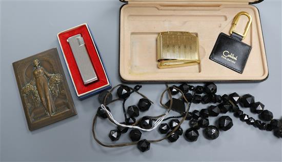 A quantity of jet, lighters and plaque